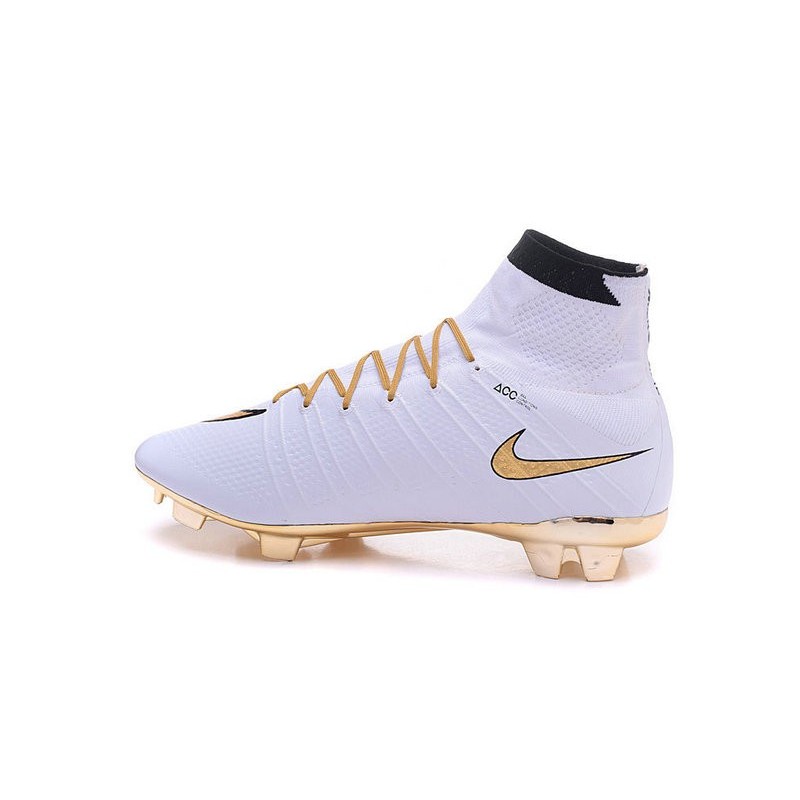 gold and white nike football boots