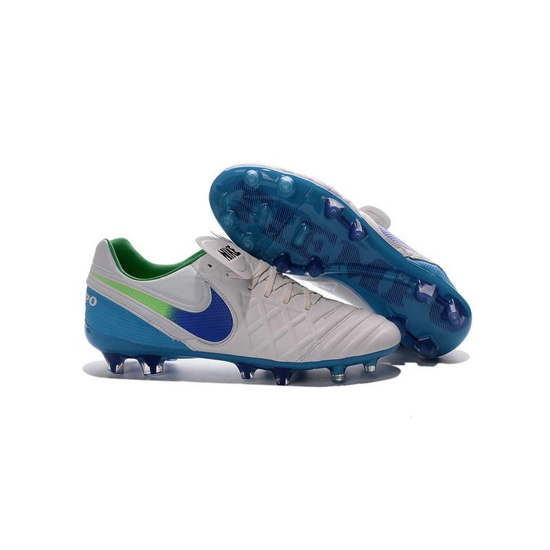 white and green nike tiempo