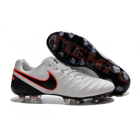 black and orange nike boots