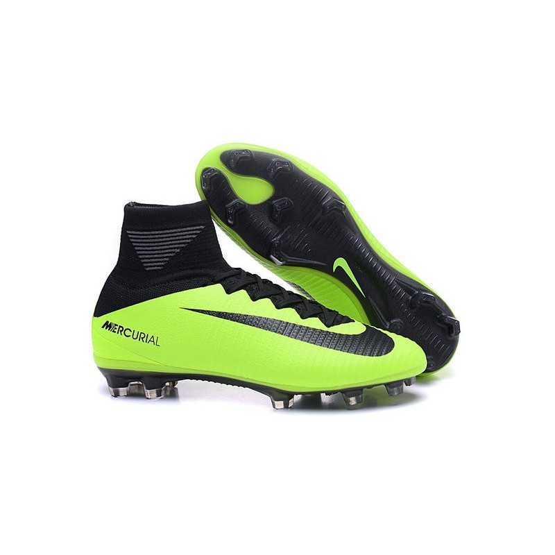 green and black soccer cleats