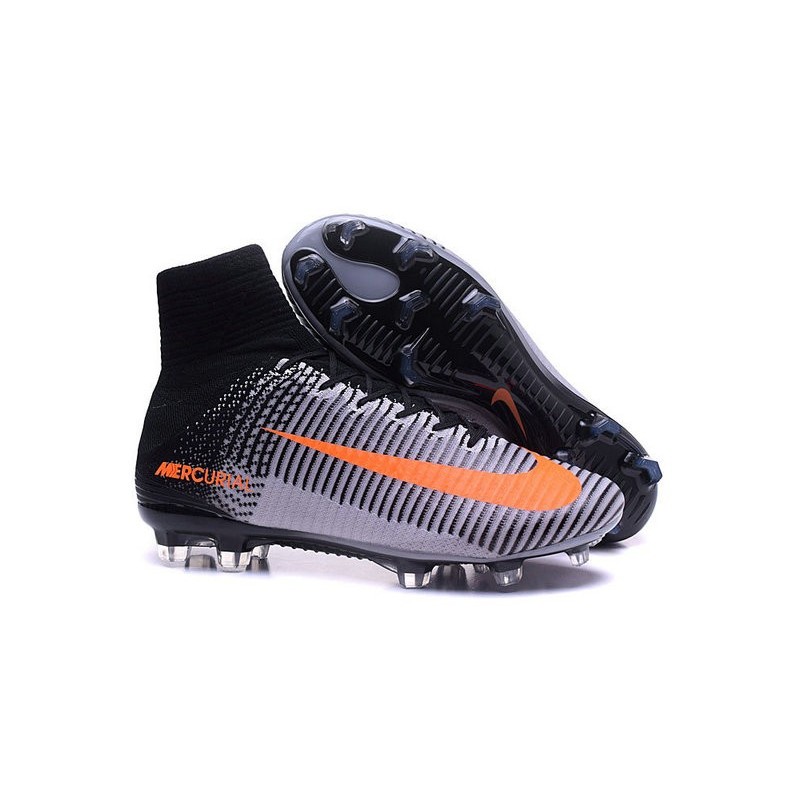 black and orange mercurial cleats