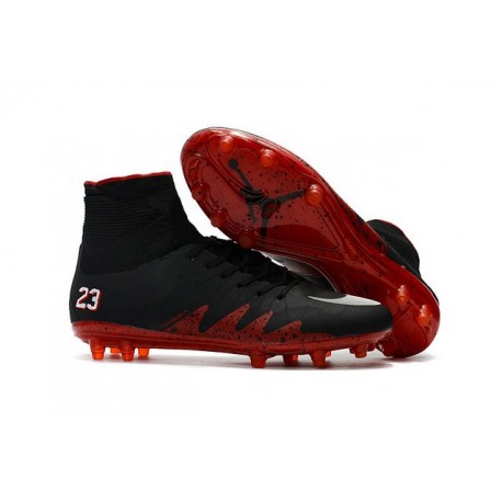 orange and black nike football cleats