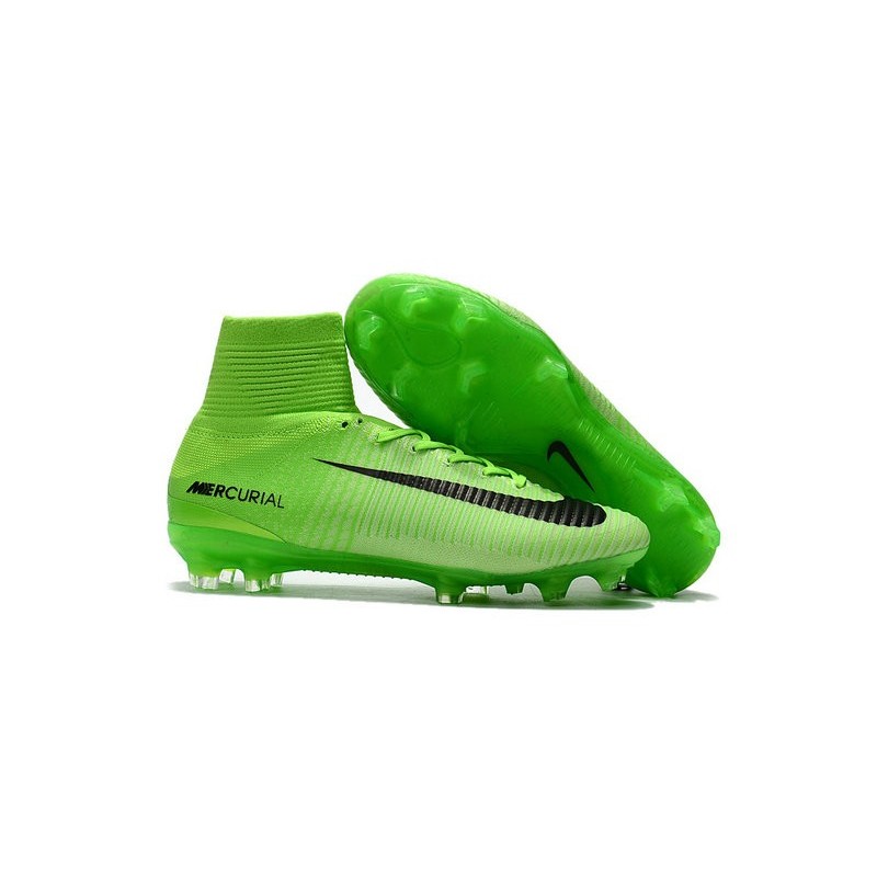 green and black soccer cleats