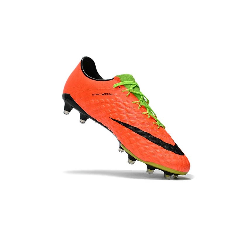 green and orange nike cleats