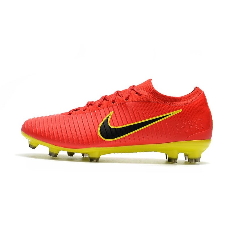 red and black nike soccer shoes