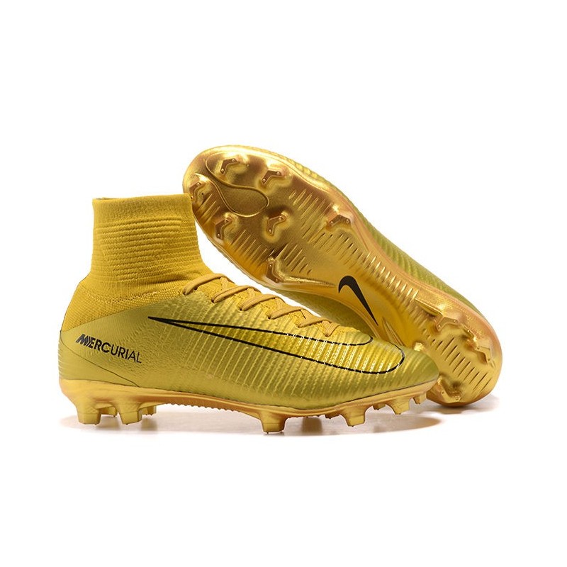 nike gold and black football shoes