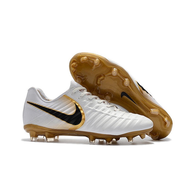 white and gold nike tiempo