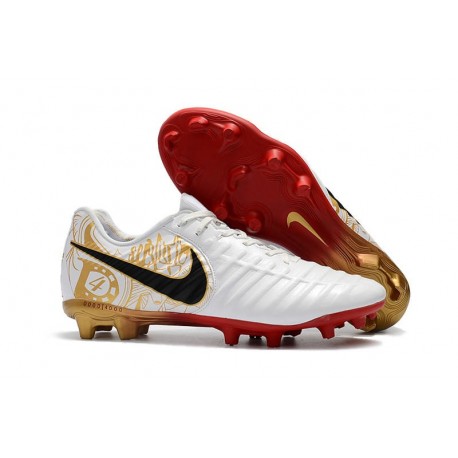 nike tiempo gold and black