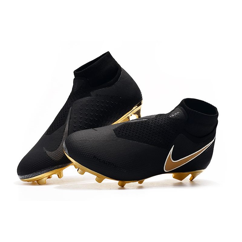 black and gold nike cleats