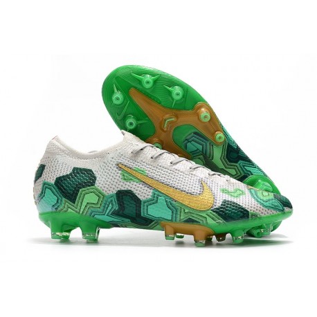 green and gold nike football cleats