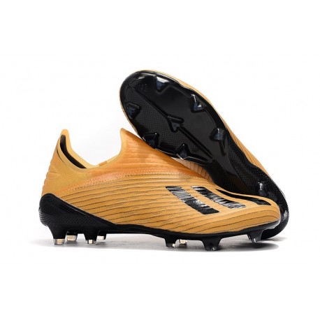 orange and black cleats