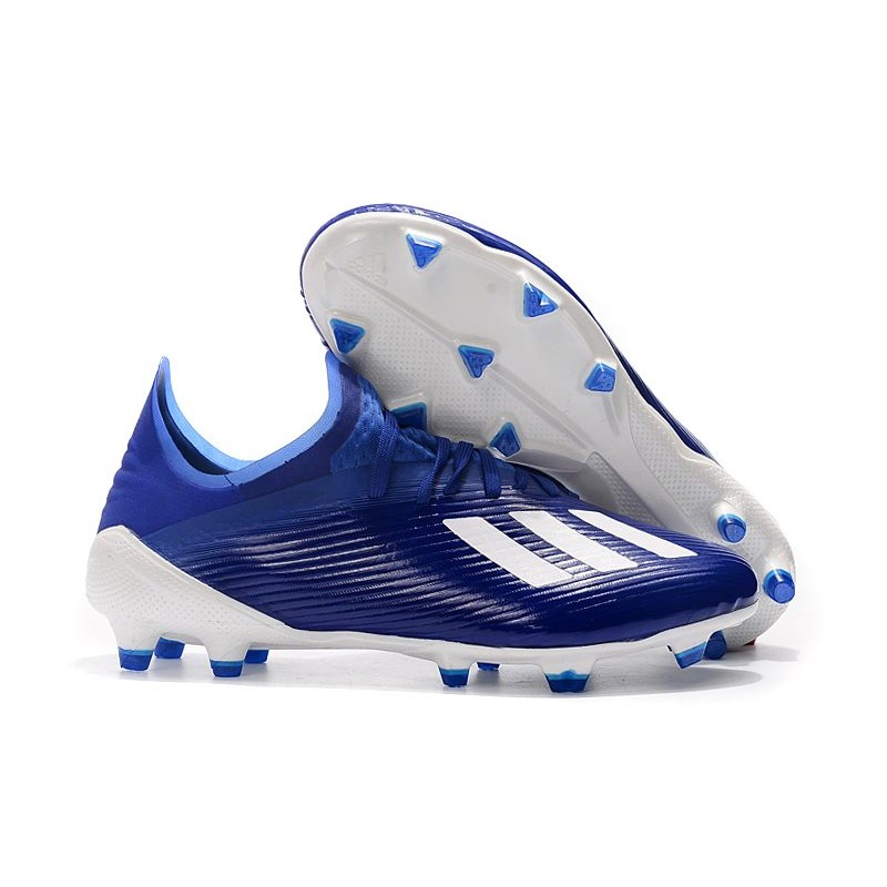 blue adidas cleats