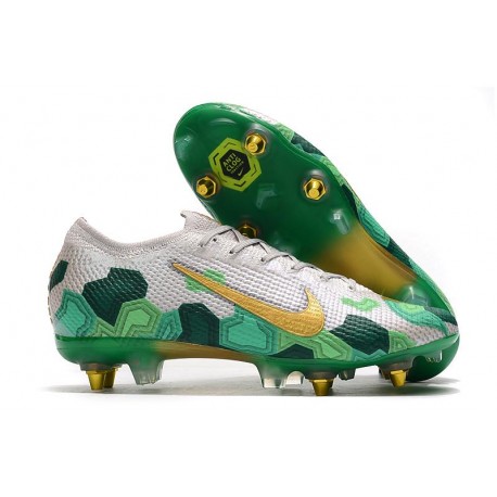 green and gold cleats